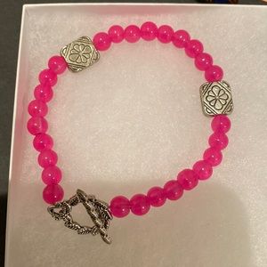 Imitation pink jade and gold pewter floral closure